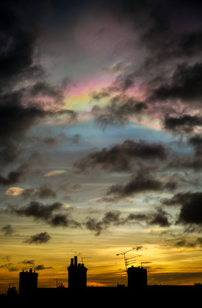 Nacreous clouds - also known as Rainbow clouds or Mother-of-Pearl clouds - are a rare type of cloud which form very high in the atmosphere and glow in vivid colorsの写真素材