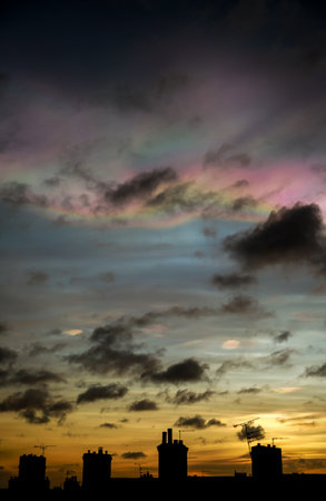 Nacreous clouds - also known as Rainbow clouds or Mother-of-Pearl clouds - are a rare type of cloud which form very high in the atmosphere and glow in vivid colorsの写真素材