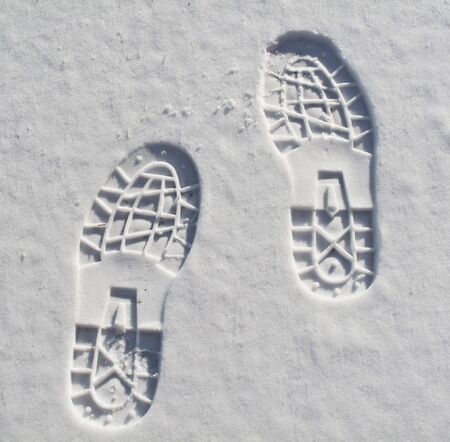 foot prints in fresh snowの写真素材