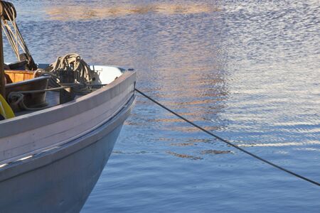 a ship moored to land