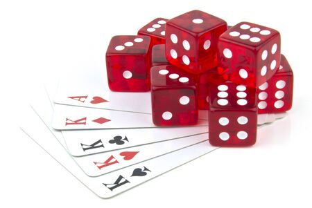dice and cards scattered on tableの写真素材