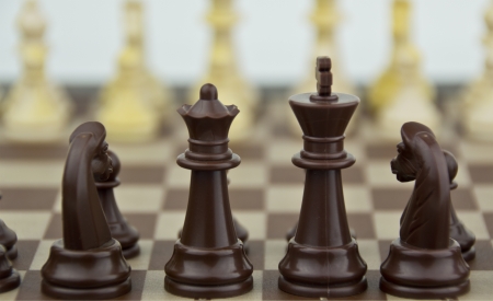 some chess pieces, soft focus in backgroundの写真素材