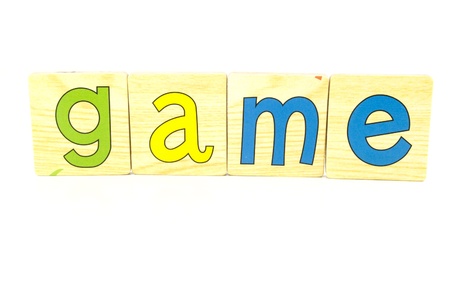 game spelt out with wooden tilesの写真素材