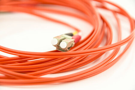 single orange fibre optic patch lead cable