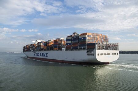 SOUTHAMPTON, UK - JULY 11, 2014 - NYK HURCULES, HONG KONG - Container Ship arriving in southampton portのeditorial素材