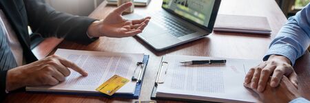 Financial Planning concept, investor colleagues discussing plan for investment with budget...