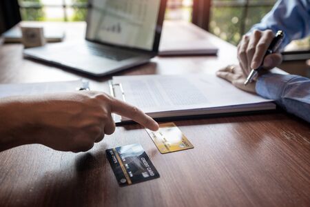 Financial Planning concept, investor colleagues discussing plan for investment with budget...