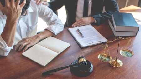 Male Notary lawyer or judge consult or discussing contract papers with Businessman client in office,...