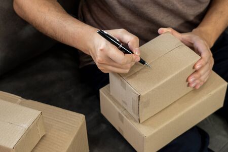 Delivery business Small and Medium Enterprise(SMEs) Workers packaging box In Distribution Warehouse...