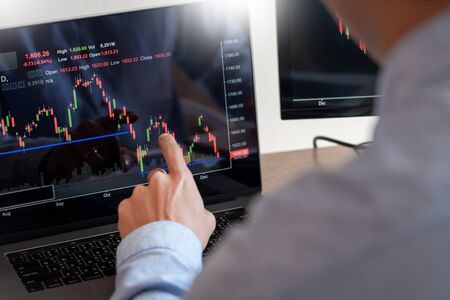 Working business man, team of broker or traders talking about forex on multiple computer screens of...