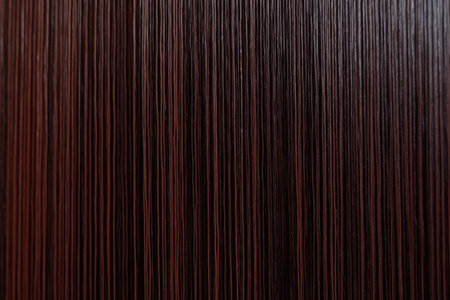 Closeup of the surface of a brown wooden wall. Abstract backgroundの素材