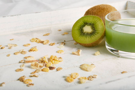 healty breakfast with kiwi fruit, cereals and juiceの写真素材