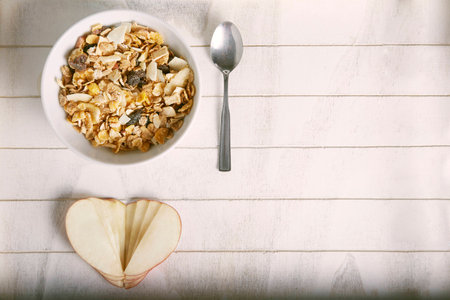 apple heart with bowl of cereals