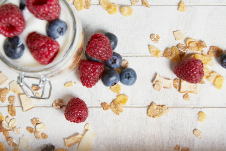 Yogurt with raspberries and blueberries cereals