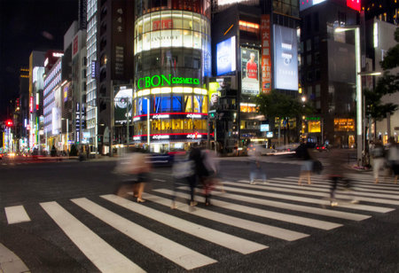 Tokyo, Japan - May 28, 2016 - People in blurry motion in luxury shopping district Ginzaのeditorial素材
