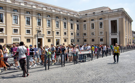 ROME - JULY, 2016: Tourists are in the line for visiting Vatican City in Rome. Security people check if everything goes on properly.のeditorial素材