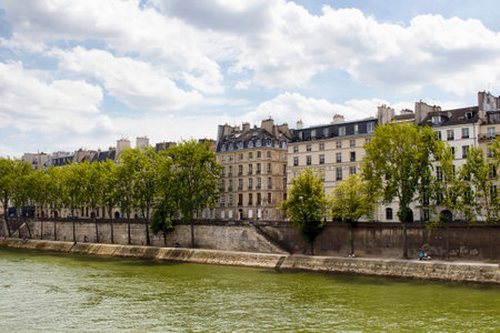 PARIS - JULY, 2016: View of buildings showing French architectural style by Seine river in Parisのeditorial素材