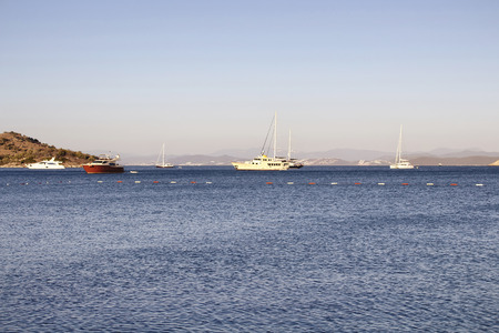 Luxury yachts parked in Turkbuku bay in Bodrum peninsula.