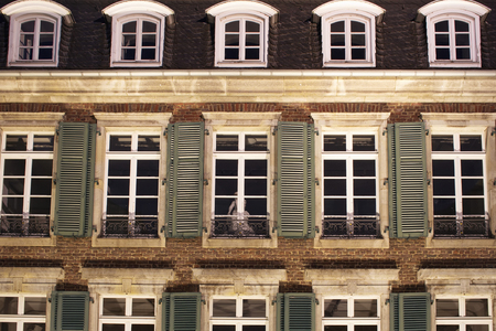 Close up view of old, historical building at night in Dusseldorf. Image shows German architectural style.の写真素材