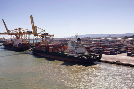 Aerial view of transportation / logistic ships, cranes and containers at Barcelona port.のeditorial素材