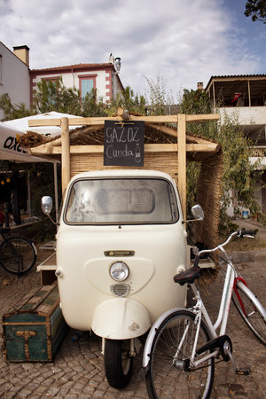 View of retro/vintage small vehicle and bicycle in Cunda (Alibey) island.