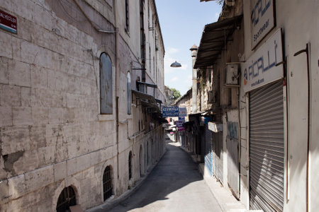 View of historical, narrow street and and closed stores in Eminonu / Sirkeci area of Istanbul.のeditorial素材