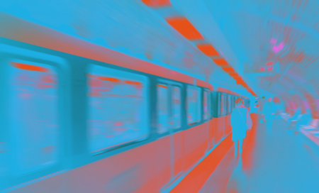 Blurry motion digital art of woman walking in subway station made with photo collage technique.の写真素材