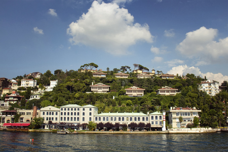 View of houses by Bosphorus on the Asian side of Istanbul. It is a sunny summer day.の写真素材