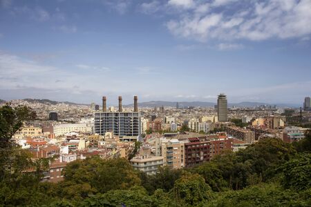Aerial view of of Barcelona city from the park called Parc del Mirador del Poble-sec. It is a sunny...