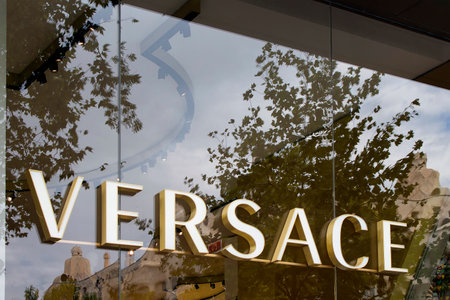 Close up view of store signage of famous, luxury Italian fashion brand's store on street called...