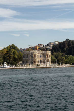 View of historical mansion by Bosphorus called Kucuk Su Kasri in Kandilli area of Asian side of Istanbul. It is a sunny summer day. Beautiful travel scene.の写真素材