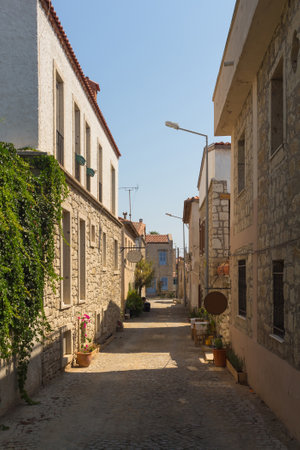 View of old, historical, traditional houses in famous, touristic Aegean town called Alacati. It is a village of Cesme, Turkey. It is a sunny summer dayの写真素材