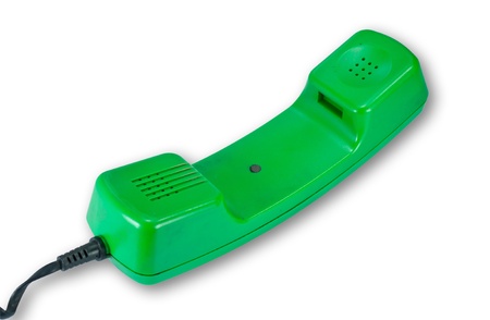 Green phone headset isolated on white backgroundの写真素材