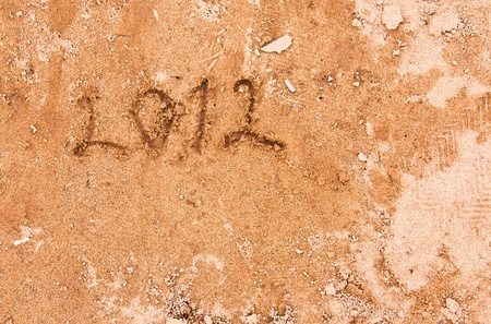 2012 Year written on the sand.  Horizontal shotの写真素材