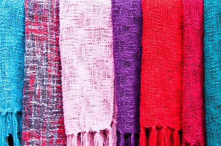 Multi-colored scarf. Was put into the background.