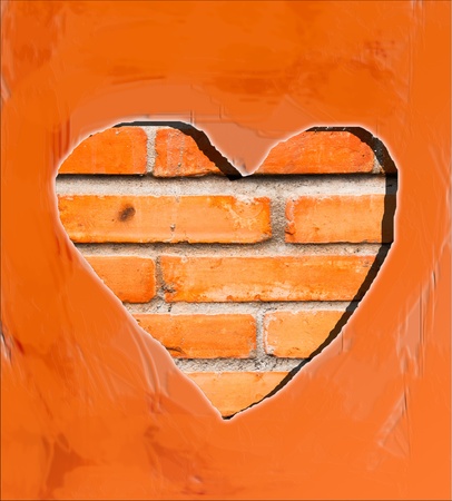The Heart shape on brickwall backgroundの写真素材
