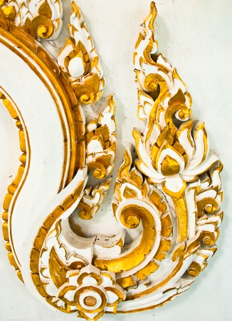 Asian art motifs. The wooden carved into shape.の写真素材