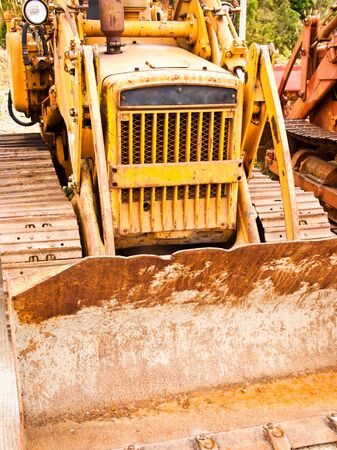 Caterpillar Tractor car  heavy yellow truckのeditorial素材