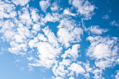 See a cloud in the sky during the day.の写真素材