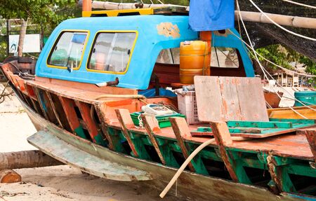Fishing boats that are waiting to be repaired の写真素材