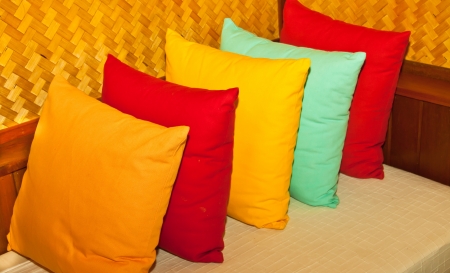 The pillows are placed on the table, bamboo weaving の写真素材