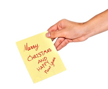 Message  merry christmas and happy new year   on the hand の写真素材