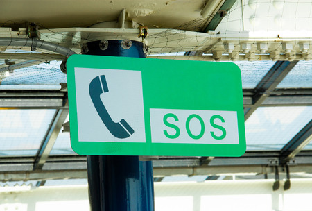 SOS sign was mounted on a pole.の写真素材