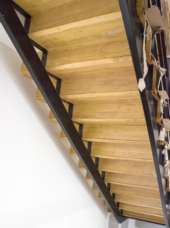 On the other side of the aisle stairs inside the building.の写真素材