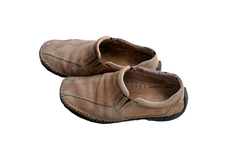 old shoes on a white backgroundの写真素材