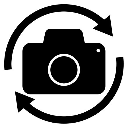 Flip and switch the camera icon. Button icon to switch cameras video call. Switch camera sign. Rotate camera symbol. flat style.のイラスト素材