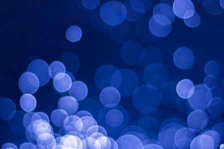 Blue bokeh background from water dropletsの写真素材