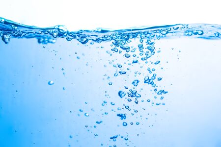 Blue water wave white backgroundの写真素材