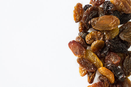 Mix raisins isolated on white background for textureの写真素材