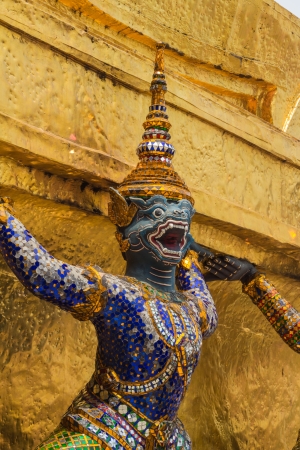 Mythological figure of the indian epic ramayana, the demon guardian, guarding the buddhist temple in the grand palace, Bangkokの写真素材